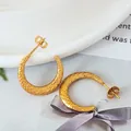 Golden C-shaped stainless steel earrings featuring textured snake skin patterns - Gold Scale Texture (B-Gold)