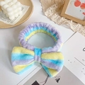 Blue yellow and purple striped plush headband with a large decorative bow tie - Purple Yellow Blue
