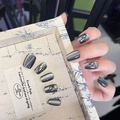 Macro detail of long dark grey cat eye press-on nails with luxury rhinestone embellishments - By1595 Black Jadeite / Glue Type