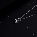 925 sterling silver S-shaped letter necklace with dancing zircon stone on black background - Style S Alphabet (NS869)