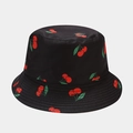 Black bucket hat featuring red cherry prints made from durable cotton canvas material - M (56-58cm) / Few Small Cherries Black