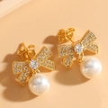 Elegant gold bow earrings with shimmering zircon micro-pave and white round pearls - Bowknot Pearl Earrings / Gold