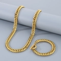 Polished golden stainless steel curb chain necklace and bracelet jewelry set on gray background - Curb Chain (11mm) / Bracelet 21cm / Gold