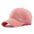 Distressed washed denim baseball cap in dusty pink with ripped details and vintage style - Pink