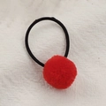 Cute children's elastic hair tie with a soft red plush pom pom on a black band - Red