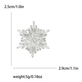 Macro view of snowflake brooch with dimensions 2.5cm by 2.9cm and 5g weight - Silver