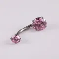 G23 Titanium navel piercing featuring 4-prong set round pink zircons and curved barbell - Pink
