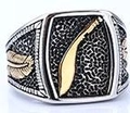 Detailed close-up of retro punk ring with gold scimitar and feather engraving details - 24302 Interlocking