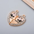 Detail of interlocking heart pendants with panda designs and BEST FRIENDS engraving - Gold Panda