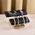 Double tier wood jewelry stand with black velvet display bars for watches and bracelets - 2-Tier Solid Wood Bracelet Stand-Black PU
