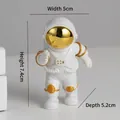 Astronaut resin figurine in white and gold finish, dimensions 5x5.2x7.4cm - Small Gold-edged Model B