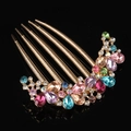 Golden alloy hair comb with colorful rhinestones in pink, blue and purple - Multicolor