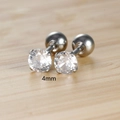 Detailed macro view of 4mm cubic zirconia stud earrings with a 4-prong setting and screw back - 4mm / Silver