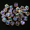 Macro shot of 4-8mm aurora AB cubic crystal glass beads with precision drill holes - Straight Hole / 4mm (100pcs/Pack) / Green Film