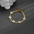 Bracciale a catena serpente in acciaio al titanio dorato con cinque motivi margherite - Cinque Margherite (N302) / Bracciale