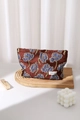 Detailed texture of blue floral tapestry fabric on a compact travel makeup bag - 26cm x 18cm / Blue Large