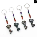 Natural bloodstone key pendant keychain with seven chakra beads on white background - Dragon Blood Stone