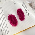 Pair of rose red lamb wool oval hair clips displayed on a French book page background - 5cm / Berry Purple 2Pcs