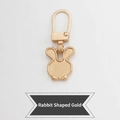 Rabbit shaped metal zipper pull in gold finish with a cute bow detail on white background - Rabbit - Gold