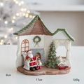 Resin Santa rocking horse house figurine 17x8x18cm Christmas holiday decor - Miniature Christmas House Ornament