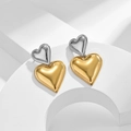 Detail of overlapping heart earrings in gold and silver finish on a white stand - [XKE0400] Two Tone Heart Earrings (Steel & Gold)