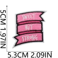 Macro shot of Sweet But Strong pink embroidered patch with 5x5.3cm size dimensions - No.27-SWEET BUT STRONG Lettering