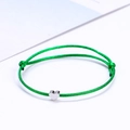 Adjustable green cord bracelet featuring a minimalist metal heart charm pendant - Green/Silver