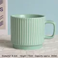 Light green striped ceramic mug with square handle and 260ml capacity on white lace cloth - Tiffany Blue