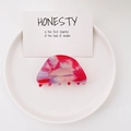 Semi-round acetate hair claw clip featuring pink and red marble floral patterns - Floral Red