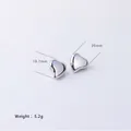 Irregular heart stud earrings in polished silver finish measuring 20mm in size - Silver