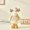 Peluche de reno navideño con patas retráctiles en color blanco crema y acabado dorado - 45cm / Reno de pierna fija