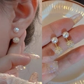 Elegantes pendientes dorados de doble cara con perla blanca y bola de cristales brillantes - Estilo de Doble Cara con Perla y Bola de Cristal Dorado (MY30755)