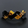 Eleganter gewellter Haarclip aus Acetat in Schildpatt und Schwarz mit geometrischem Design - Tortoise