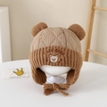 Detail of baby winter hat featuring bear ears and cute bear embroidery on quilted fabric - 2-5 Years Old / Caramel color