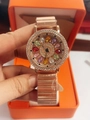 Elegant rose gold women's watch featuring a colorful gemstone dial and rhinestone bezel - Rose Gold