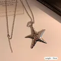 Macro detail of silver starfish necklace showing 70cm chain and hammered metal texture - Hammered Starfish Metal Pendant Style (14# Necklace-Silver)