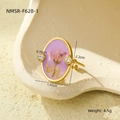 Detail view of gold steel ring with purple resin, dried flowers, and crystal accents - Purple Oval (NMSR-F628-1)