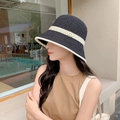 Women's straw bucket hat in black with white stripes and a golden metal M logo detail - L (54cm-58cm) / Black M Logo