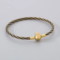 Bracciale a cavo intrecciato nero e oro con una perlina portafortuna simbolo Fu - Sacchetto di Soldi Carattere Fu - Nero e Oro