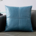 Blue faux leather square pillow cover with cross stitching on black leather sofa - Navy Blue