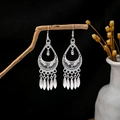 Ethnic silver drop earrings with hollow teardrop design and dangling metal leaf tassels - Silver Water Drop Hollow Leaf Tassel Style (E5367)