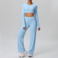 Two-piece sky blue workout set featuring a long sleeve crop top and wide leg yoga pants - Sky Blue