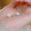 Silver snowflake stud earrings with sparkling cubic zirconia and screw ball back - Rhinestone Snowflake Round Ball (A145)