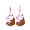 Vintage geometric earrings made of dark wood and clear resin with gold hooks on white - Pink Petal Wood Patchwork