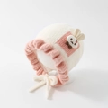 Close-up of knit baby bonnet featuring a cute rabbit patch and pink plush lace trim - 50cm 1-2 Years / Rabbit-White