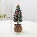 Miniature resin Christmas tree with gold star and red bows on a vintage sack base - Large (17cm/229g)