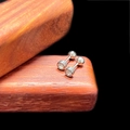 Macro view of silver barbell ear studs with bezel-set round cubic zirconia stones - 4mm Barbell Style (Single) / Steel
