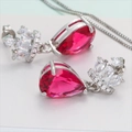 Elegant crown design jewelry set with pear-cut red rubies and sparkling silver necklace - Stud Earrings