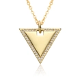 Close-up of golden triangular pendant necklace with sparkling micro-pave crystals on edges - Triangle Style (E275)