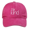 Detailed view of white Be Kind embroidery on a rose pink washed cotton baseball cap - Rose Red